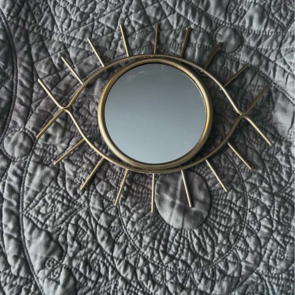Like new gold metal eye mirror